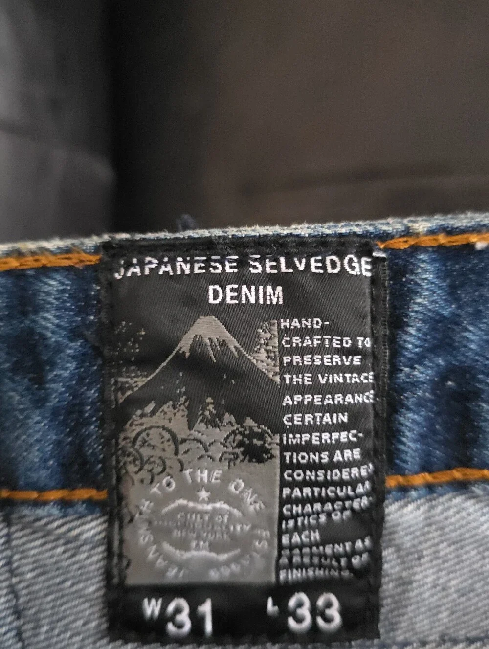 Cult of Individuality Distressed Skinny Jeans in Faded Blue with Zipper Cuffs